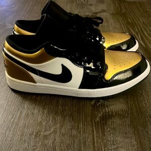 "Air Jordan 1 Low Gold Toe: Elevate Your Style with Opulent Sophistication"
